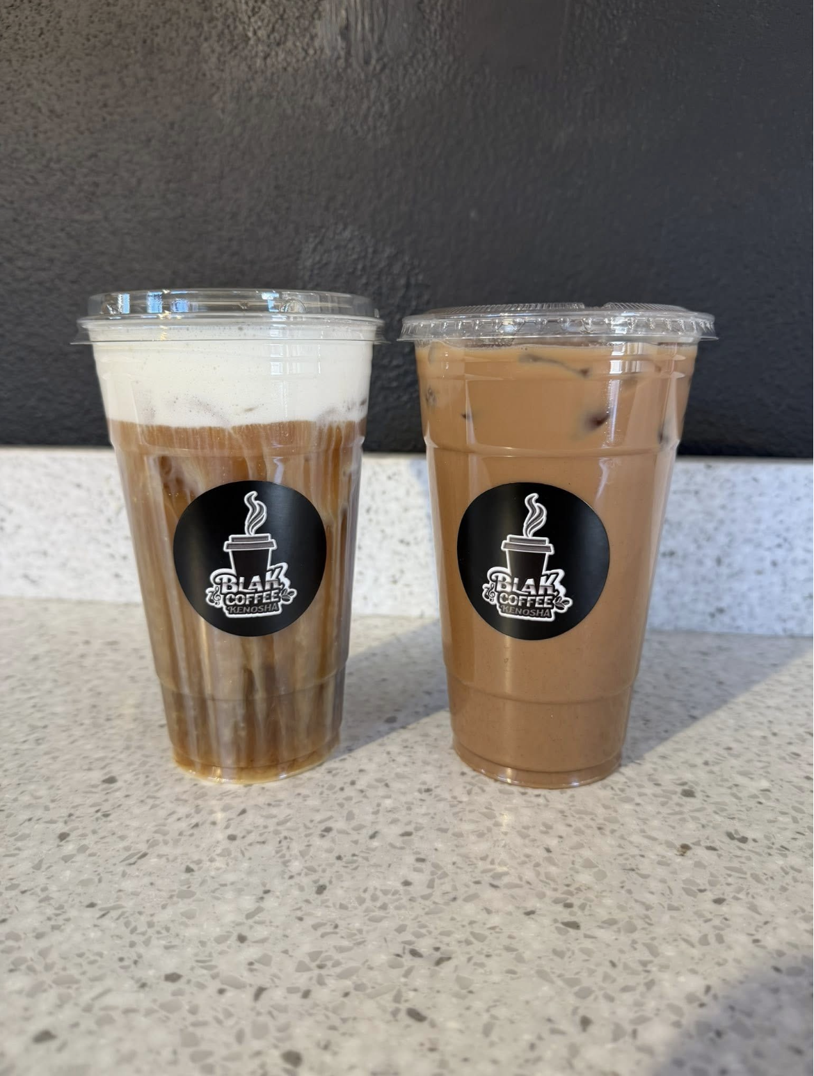 Two iced specialty drinks from BLAK Coffee Kenosha